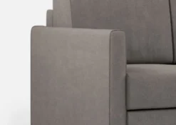 Divano 138x85cm design a due posti con pouf stoffa idrorepellente grigio DI26