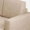 Divano 212x85cm design a tre posti con piedini in legno e pouf idrorepellente beige DI39
